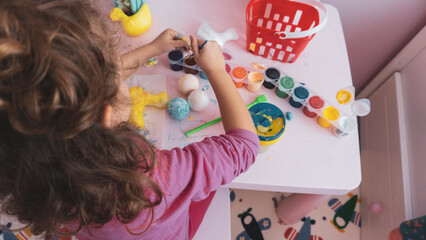 Child Painting with Watercolors