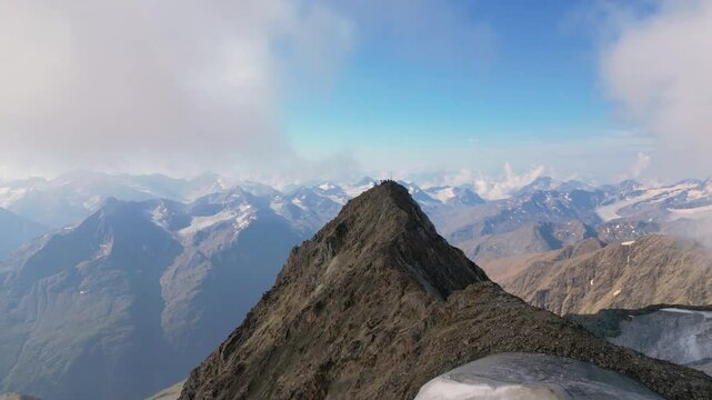 Experience the breathtaking view from the summit of Wildspitze, the highest peak in the otztal Alps, showcasing the stunning landscapes of North Tyrol and beyond.