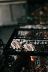 meat on the grill of a BBQ