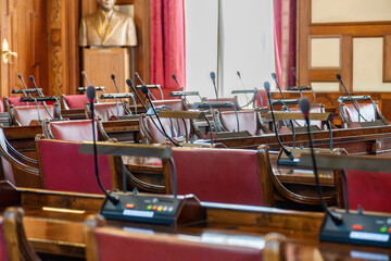seats of politicians in parliament.