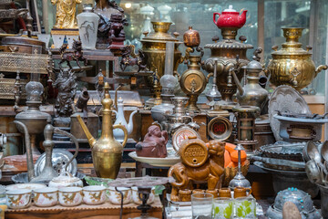 Antique display featuring a clock with clock written on it, Kashan, Iran