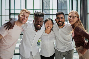 Obraz premium Strong and creative team. Group of business people and smiling at camera