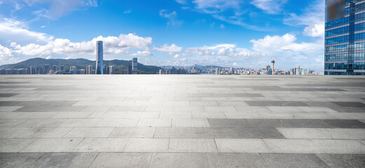 Fototapeta premium Expansive Urban Skyline with Dramatic Clouds and Modern Architecture