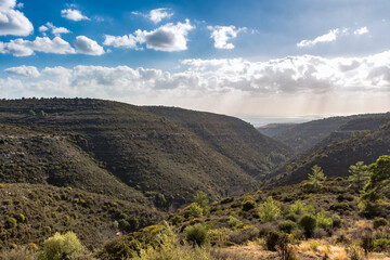 Tranquil Cypriot Landscape: Mountain View with Clear Sky and Sparse Vegetation