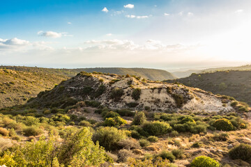 Fototapeta premium Tranquil Cypriot Landscape: Mountain View with Clear Sky and Sparse Vegetation