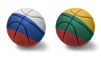 basketball balls with the national flags of lithuania and russia on the white background.