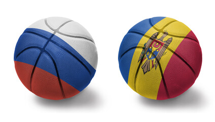 basketball balls with the national flags of moldova and russia on the white background.