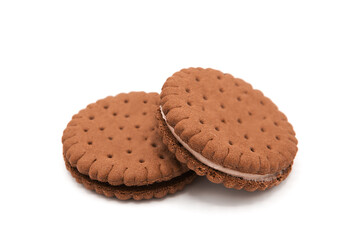 Delicious chocolate cookies with filling isolated on white background. Handmade traditional sweets. Clipping Path.