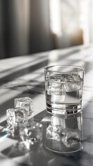 Minimalist composition of ice cubes on reflective surface for modern design concepts
