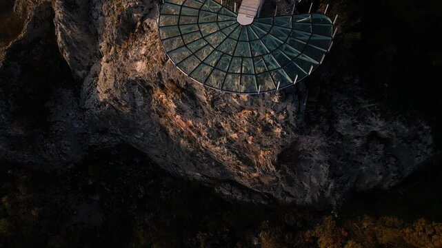 Aerial scenic view of modern and futuristic glass skywalk viewpoint, extending over mountain Ovcar and Kablar canyon in Serbia. Meanders of West Morava river. Ovcarsko-Kablarska gorge.