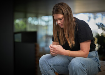 Female ostracized from group, left alone from friends. Mental health, introversion and sadness shown. Actress portraying mental illness, depression, anxiety, eating disorder, ADHD, or other mental ill