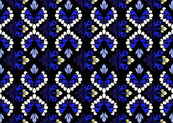 Ikat floral paisley embroidery ethnic traditional seamless pattern motif handmade.
 Ethnic Ikat abstract background. 
Ethnic floral embroidery design for decorative home carpet curtain pillow geometr