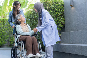 Female healthcare professional providing at home medical care to elderly woman with smile, senior patient, nursing, listens attentively to nurse, elderly care, home health services, patient at home