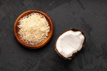 Cocos nucifera - Fresh grated coconut in the bowl.