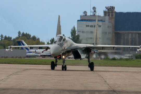 MAKS-2013. Soviet-Russian multi-role fighter Su-35 (NATO - Flanker-E) of "four plus" generation, plus taxis along take-off runway. Aircraft close-up. Zhukovsky, Russia - August 27, 2013