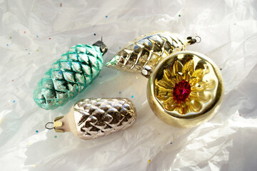 Vintage golden glass soviet Christmas tree toys. Retro style Christmas ornament on white paper with...