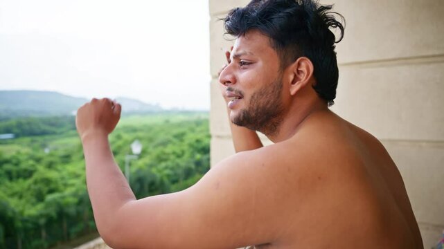 Adult Male in Tension Smoking