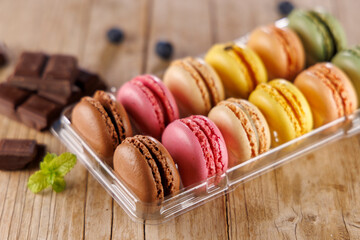 colorful macaroons in box. french pastry, bakery
