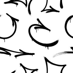 Seamless pattern of sprayed graffiti arrows with overspray in black over white. Vector illustration template