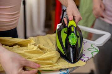 Steam Ironing Clothing Effectively on a Standard Ironing Board for Best Results and Care
