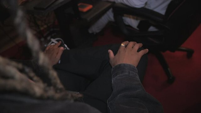 Man beating rhythm on his leg in music studio
