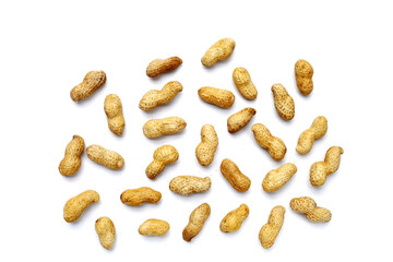 Roasted peanuts in shell on white background.