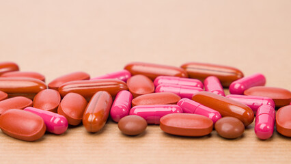pills on brown background with copy space for text or image.