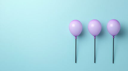 serene still life featuring three lavender balloons on black sticks against soft blue background, creating calm and cheerful atmosphere