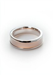 A silver and gold ring with a white background