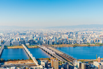 Fototapeta premium Yodo river with Osaka city skyline view, Osaka province Japan.