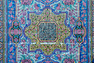 A closeup view of a stunning mosaic ceiling in Nasir ol-Molk Mosque