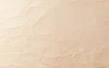 Obraz premium Textured beige paper background with natural creases, perfect for highlighting design elements or creating a vintage aesthetic.