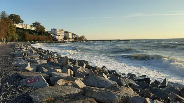 Beach of Sassnitz on R&uuml;gen with high waves in autumn on the Baltic Sea 4k video