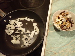 preparation of a mushroom soup in kitchen