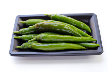 Chili peppers on a white background.