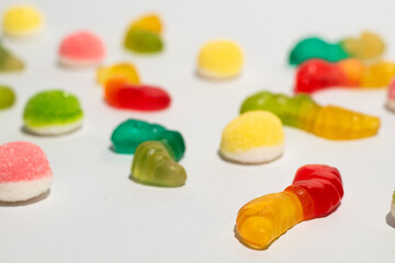 Colorful gummy candies on isolated white background