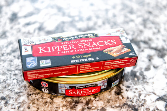 Avon, USA - January 7, 2022: Closeup packaged food store brand of Crown Prince Kipper snacks with herring smoked and sardines