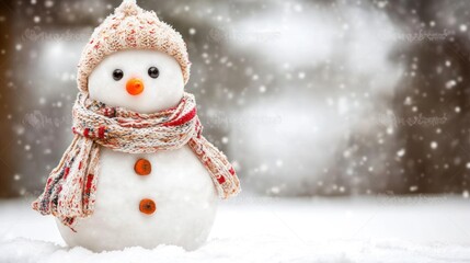 Obraz premium A cheerful snowman wearing a hat and scarf stands in a snowy landscape with falling snowflakes.