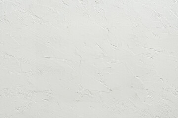 A close-up view of a textured white wall, perfect for backgrounds or design applications.