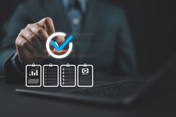 Businessman check and check mark online ,Business Agreements and Approvals ,Confirmation of contract documents or warranty card ,procedure company articles of association Terms and Conditions