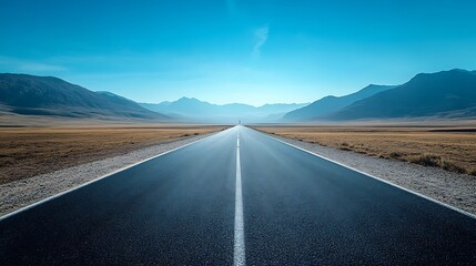 Fototapeta premium Explore the endless road leading to majestic mountains