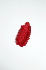 Cosmetic smear. Smears of body scrub on white background. Fruit and berry body scrub texture of swatch