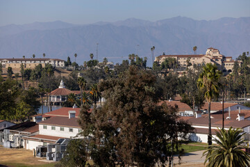 Afternoon sun shines on historic buildings in historic downtown Norco, California, USA.