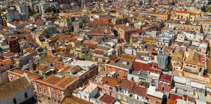 Fototapeta Aerial view of houses, palaces, apartments and roofs in Barletta Puglia, Italy.
