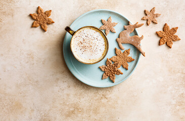 Fragrant coffee with cinnamon and Christmas cookies in the form of stars.