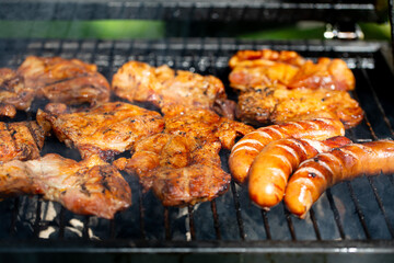 Experience the amazing deliciousness of grilling chicken and sausages on the BBQ grill