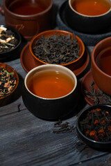 tea assortment. black, floral and herbal drinks, vertical
