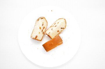 slices of raisin pie on a white plate