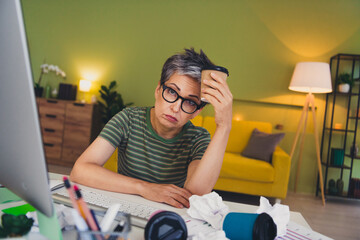 Photo of charming pensioner lady stressed work night shift overloaded dressed green garment house...