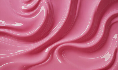 A close-up of pink, glossy liquid swirled into abstract patterns